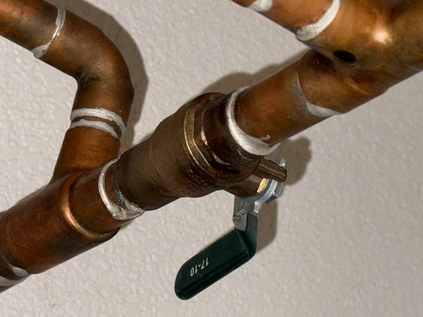 Copper water pipes with a shutoff valve and its lever handle